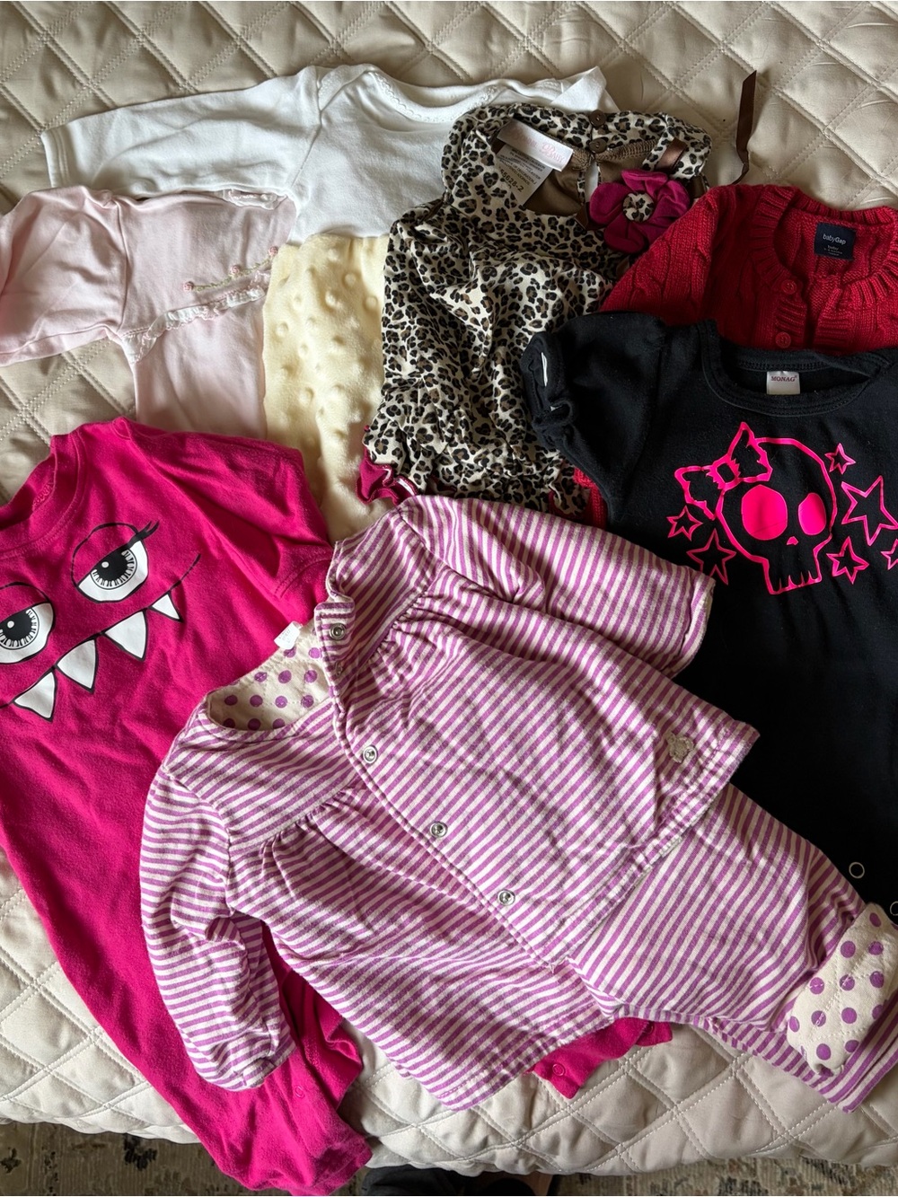 Box of Girls infant outfits